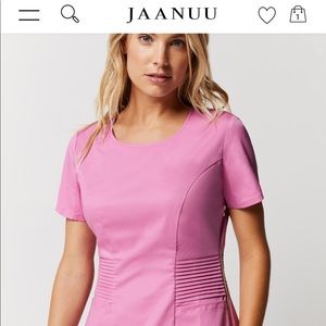 Pink Jaanuu scrub top like new, size small.